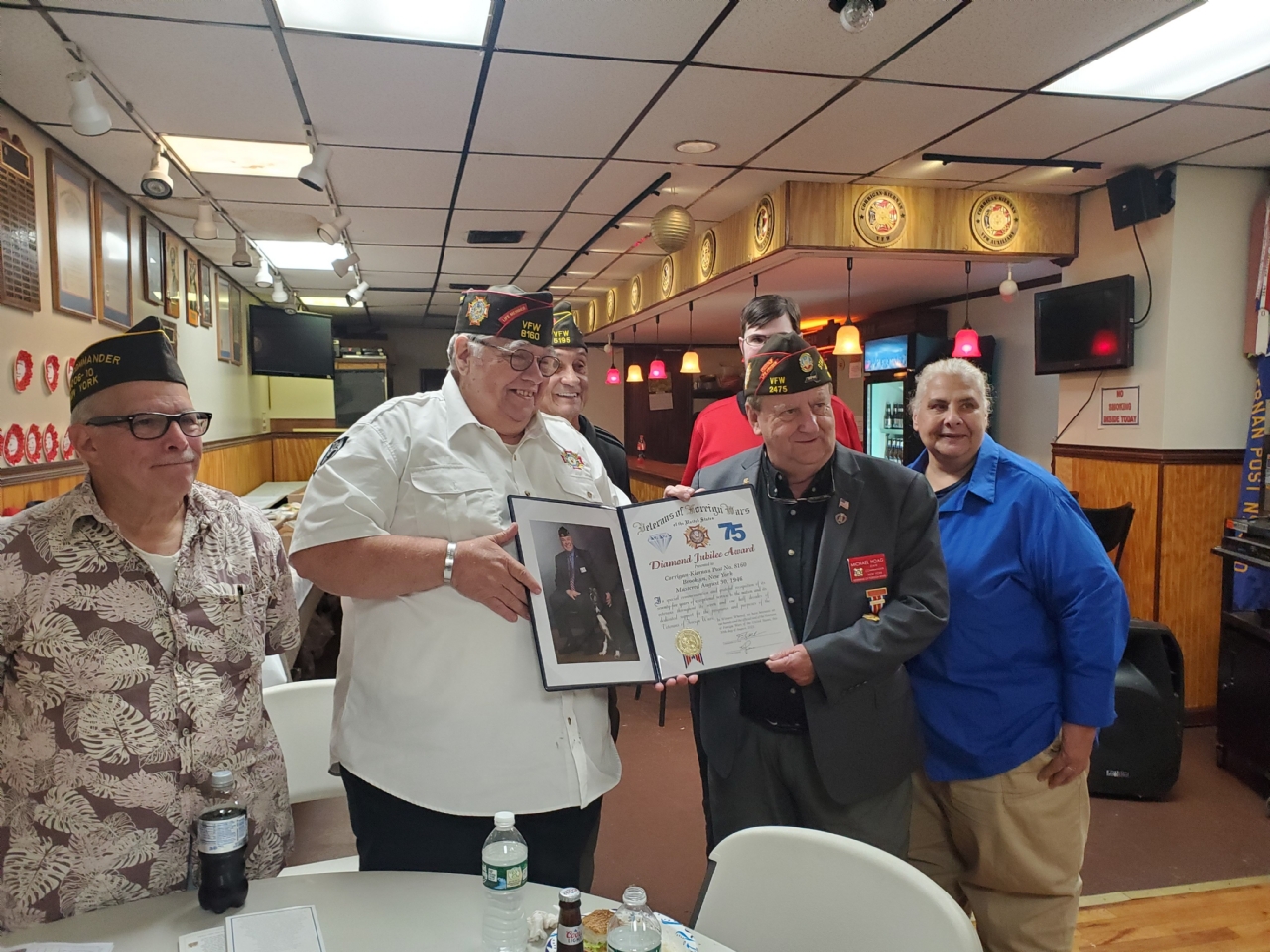 Brooklyn County Commander & Post 8160 Commander Jack Sanford receiving their Diamond Jubilee Award in recognition of their 75 years of service to Veterans and the Community.